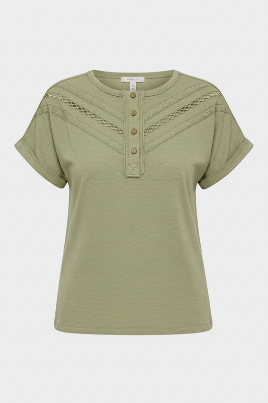 Green short-sleeve top with button details on a white background