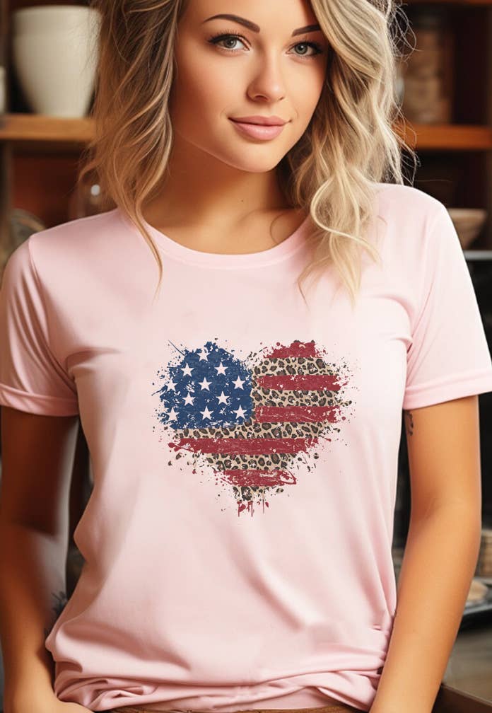 Woman wearing a pink t-shirt with a graphic design of an American flag.
