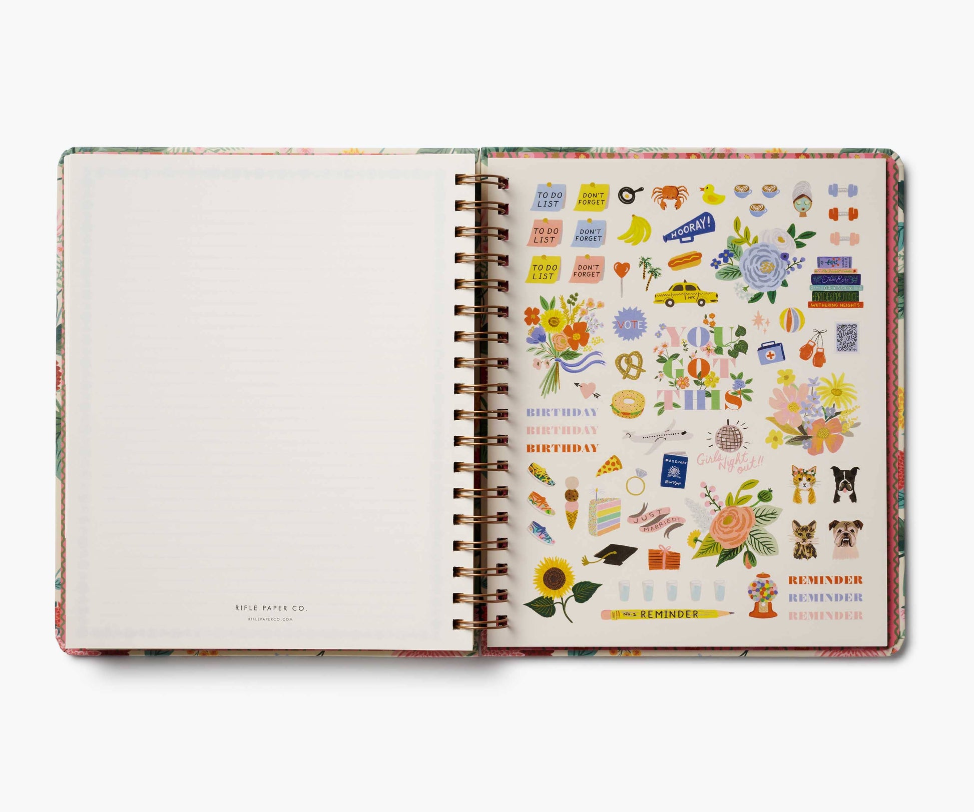Open planner with decorative stickers on a white background