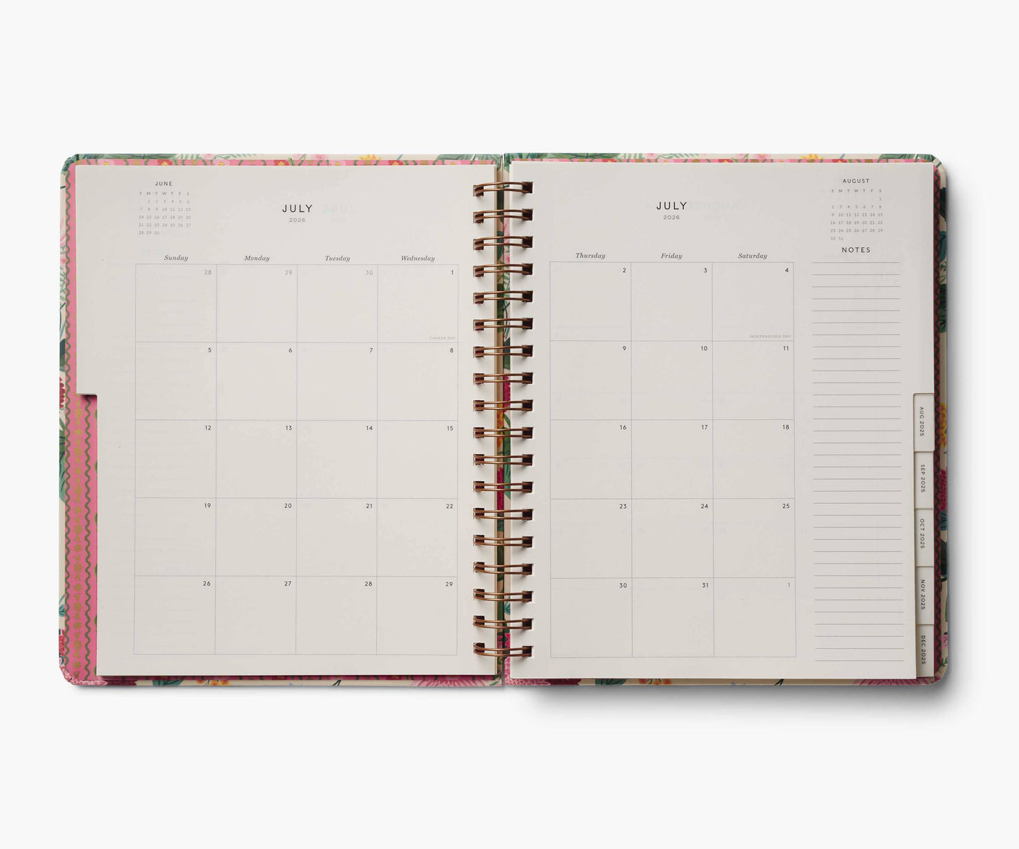 Open planner with monthly calendar and notes section on a white background