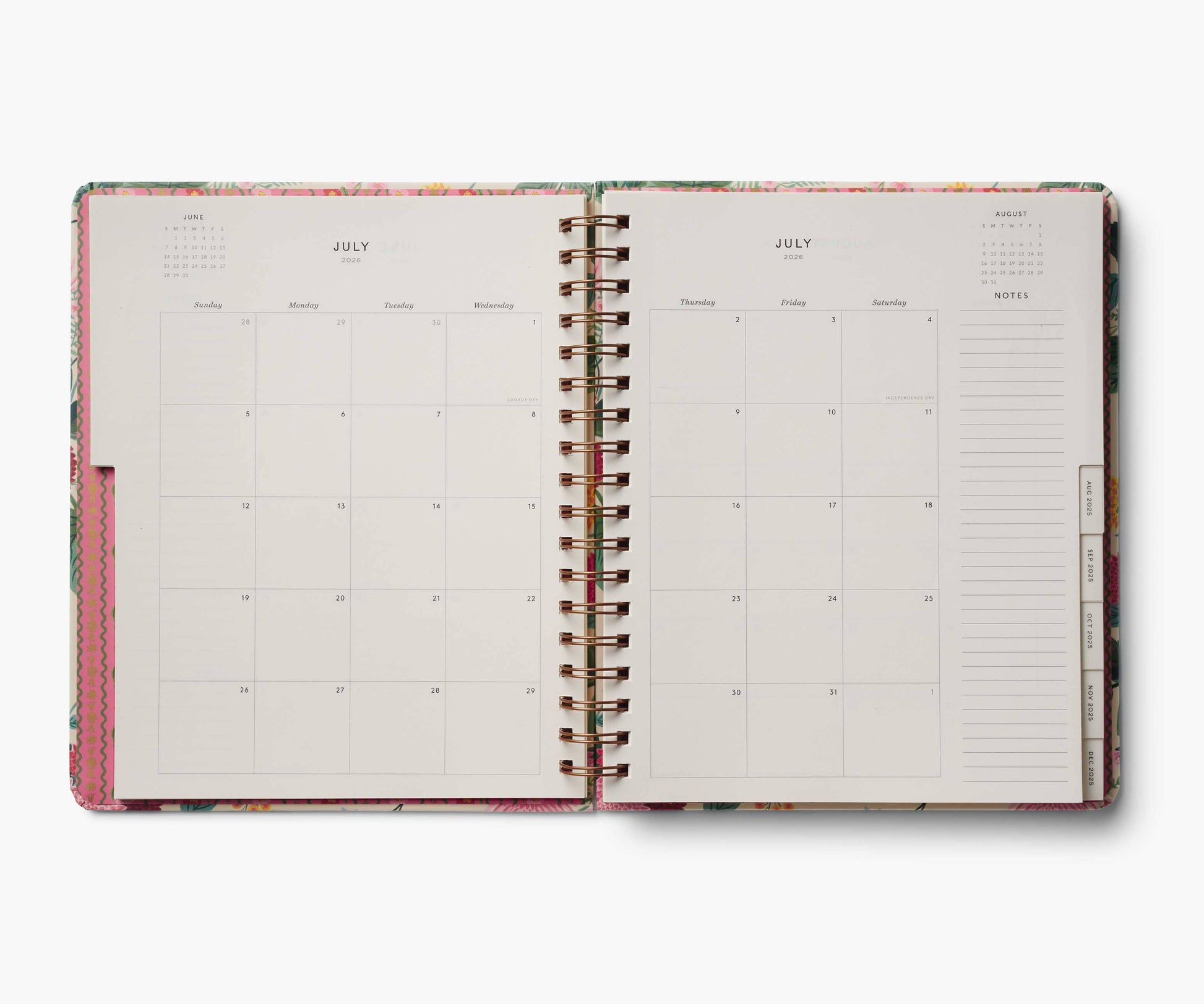 Open planner with monthly calendar and notes section on a white background