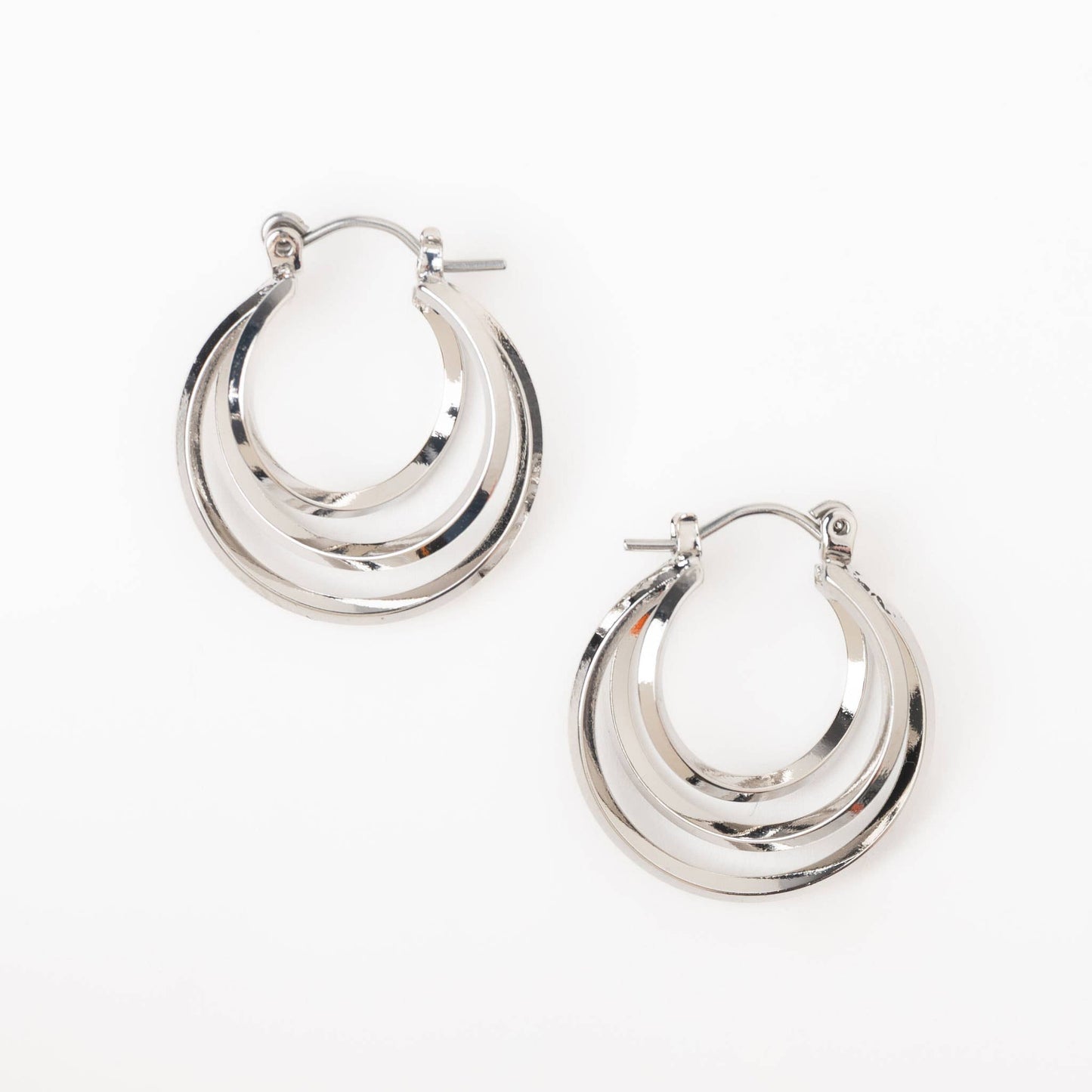 Silver Hoop Earrings featuring a classic multi-hoop design, perfect for elevating any outfit with their stylish charm.