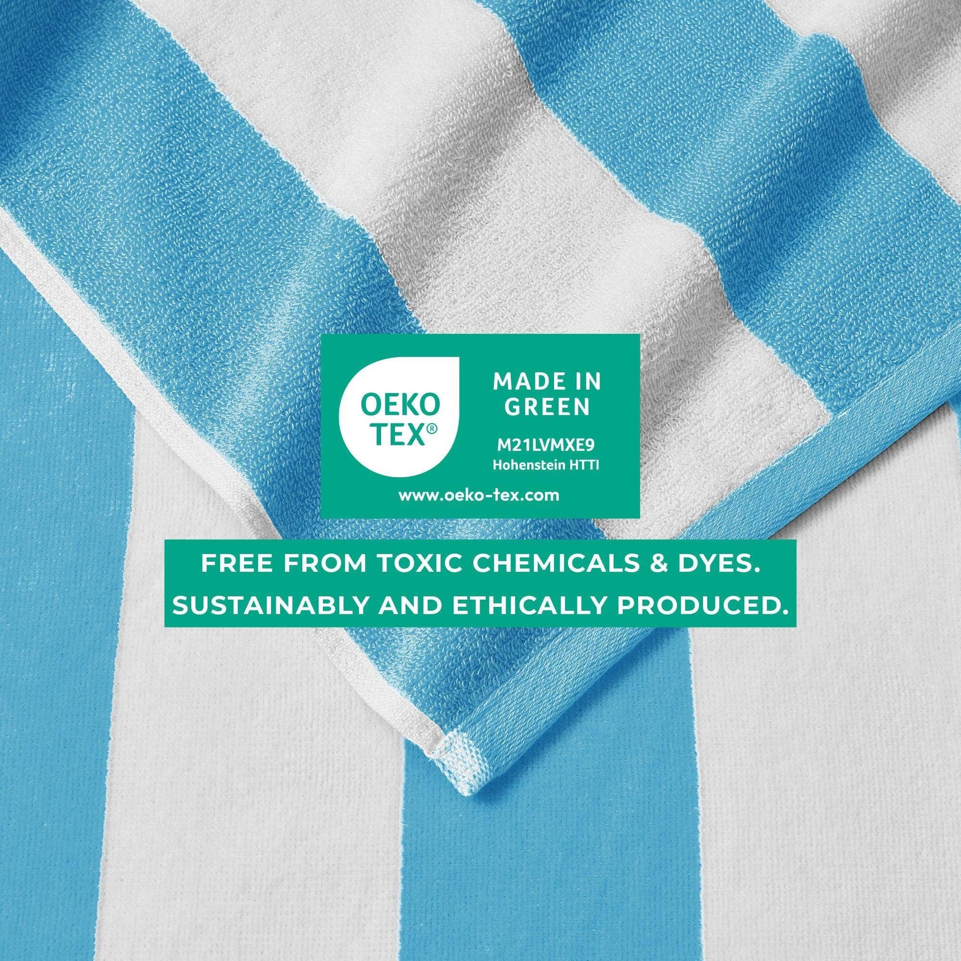 Blue and white towel with OEKO-TEX certification label on a white background