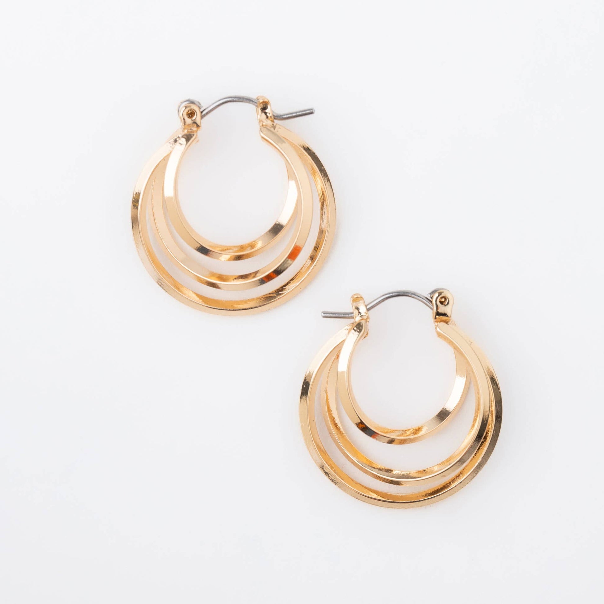Gold Hoop Earrings featuring a classic multi-hoop design, perfect for elevating any outfit with their stylish charm.