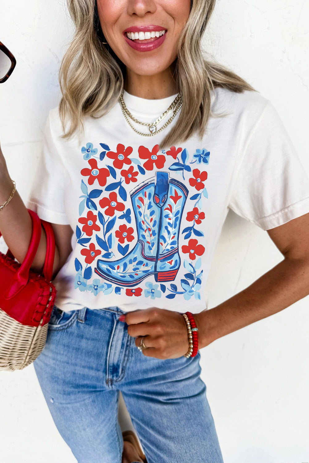 White T shirt with graphic boot in blue and red