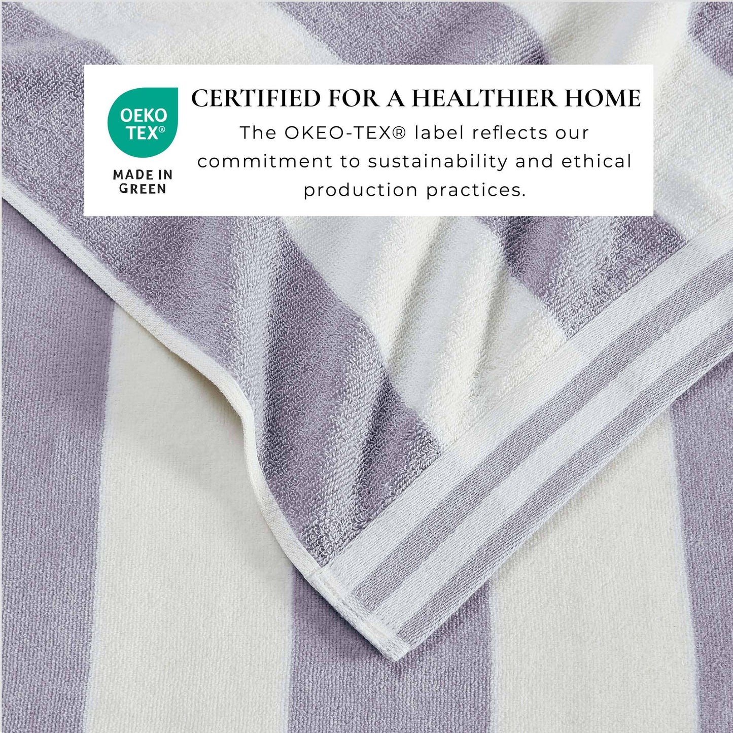 Striped towel with Oeko-Tex certification label on a white background
